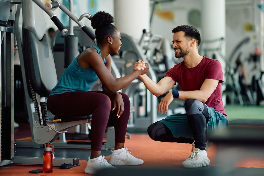 Athletes supporting each other after a workout